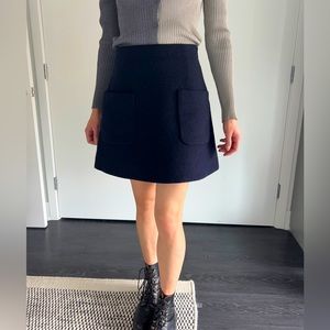 Navy blue wool flared a-line patch pocket mini skirt from COS with side zipper